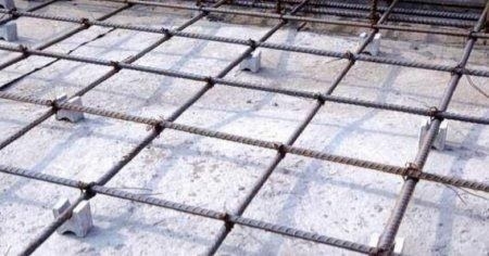 Provision of concrete cover for reinforcement bars in slab